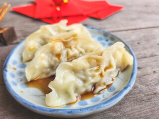 Steamed dumplings pork and  Chinese new year red envelope