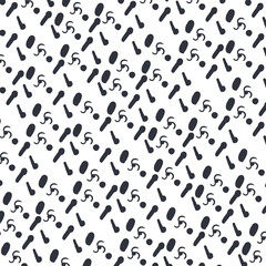 The texture consists of small spots, dots and swirls that look like fans.