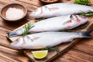 Raw sea bass fish photography . Top view