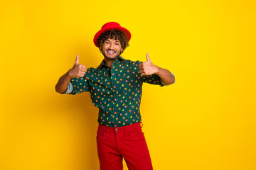 Photo of attractive elegant young man show thumb up wear shirt isolated on yellow color background