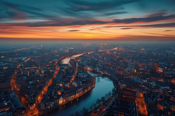 Fototapeta premium City Aerial Night. Aerial View of Leiden City at Night with Urban Skyline and Clouds