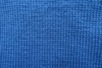 Background - simple plain blue knitted fabric texture