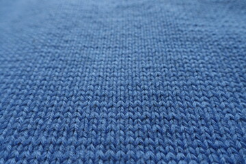 Close up of simple plain blue knitted fabric
