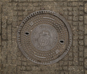 manhole cover in the street	

