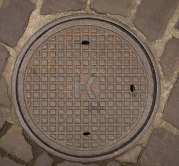 manhole cover in the street	
