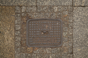 manhole cover in the street	
