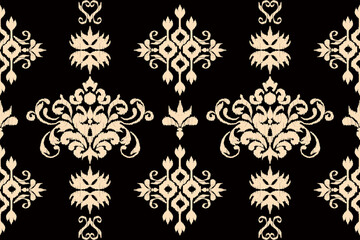 Motifs Ikat floral paisley embroidery on black background.geometric ethnic oriental pattern traditional.Aztec-style abstract vector illustration. Design for texture,fabric,clothing,wrapping,decoration