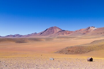 Desert Landscape with Distant Mountains