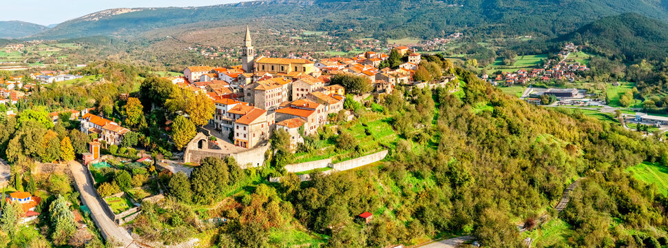 Aerial panoramic view of beautiful ancient town Buzet. Rural landscape on Istria Peninsula. Travel in Croatia