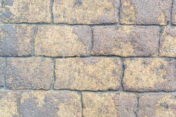 Printed concrete texture background simulating cobblestones