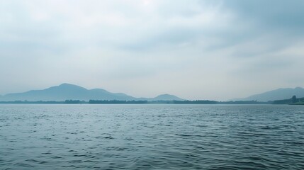 The Gorgeous Scenery of West Lake in Hangzhou with Its Calm Waters, Lush Greenery, and Graceful Bridges