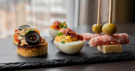 Holiday Appetizer Set with Deviled Eggs, Bruschettas, and Spirals