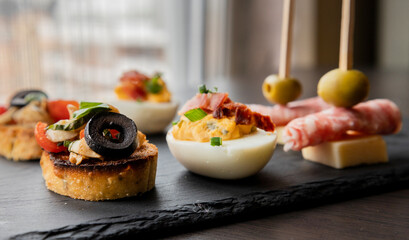 Holiday Appetizer Set with Deviled Eggs, Bruschettas, and Spirals