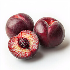 Three plump, ripe plums with one cut open, showcasing its juicy flesh and pit, against a clean, white background.
