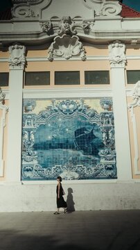 Beautiful female walking in different streets of Lisbon Portugal travel vertical videos