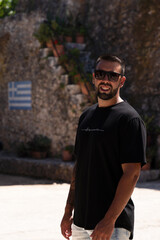 Young male tourist visiting the Monastery of Anafonitria in Zakynthos