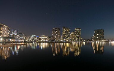 Dockyard landscape view at night with buildings