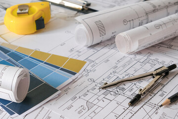 Architects concept,eco project house,Retrofit movement,engineer architect designer working drawing sketch plans blueprints and making construction eco model