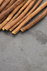 Dried medicinal licorice sticks - Glycyrrhiza glabra.
