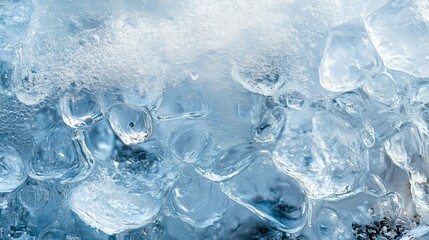 Ice formations glistening in sunlight, showcasing the intricate patterns and textures of frozen water on a chilly winter morning.