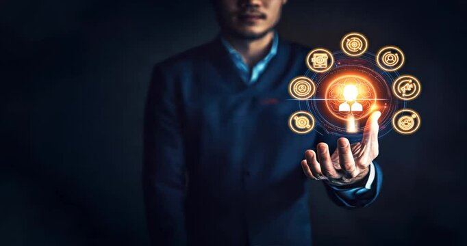 Businessman touches a virtual human icon on a screen with business icons, digital advertising target, customer retargeting, online marketing, retargeting ads