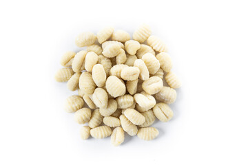 Tasty raw gnocchi isolated on white background