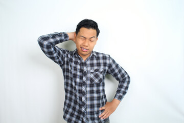 unhealthy asian man feel migraine and fatigue isolated on white wearing casual shirt