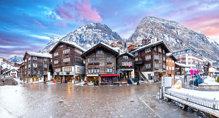 Idyllic mountain village of Zermatt square panoramic view, luxury Alpine winter destination