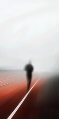 A blurry image of a person walking on a track