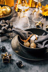 Elegant place setting for Christmas, New Years Eve, glasses of sparkling wine
