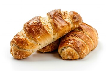 A pair of buttery croissants stacked on top of each other, awaiting their fate
