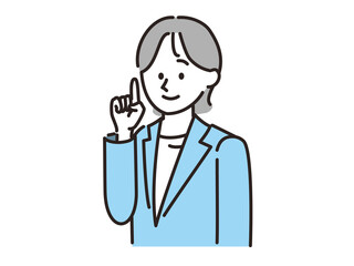 スーツで人差し指を立てる女性