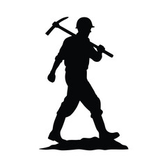 A man is holding a pickaxe and walking on a rock. He is wearing a helmet