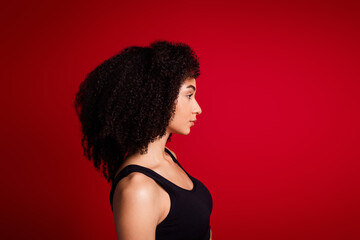 No retouch profile photo of lovely gorgeous stunning woman wear black stylish top isolated on red color background