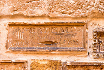 Carvings in the walls of Chateau d'If fortress. It is famous for being one of the settings of Alexandre Dumas adventure novel The Count of Monte Cristo.