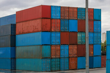 Close view of shipping containers at seaport.