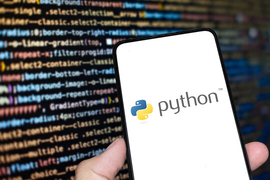 Python logo sign on the smartphone screen with code background. London, UK, 11.14.2024