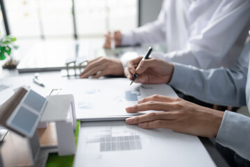 Solar panels green energy Business man working green eco friendly office business creative idea Planing Bio economy for business eco friendly professional Engineer sustainable electricity.