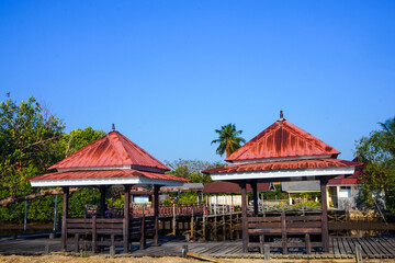 Row of gazebo tourist attractions on the river bank