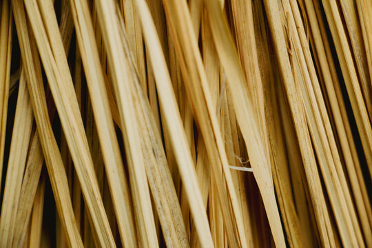 close up of a straw, Dried leaves of cogon grass, also known as Lalang, Natural background texture, traditional Asian house texture background