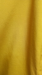Soft, luxurious golden yellow fabric.