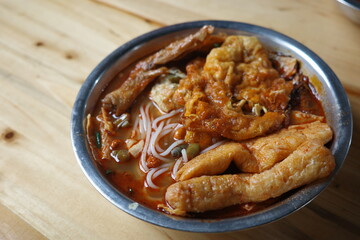 Close-up of a bowl of spicy and delicious Guangxi snail rice noodle