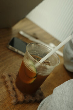 Close-up of a cup of cool and delicious iced lemon tea in a Hong Kong tea restaurant