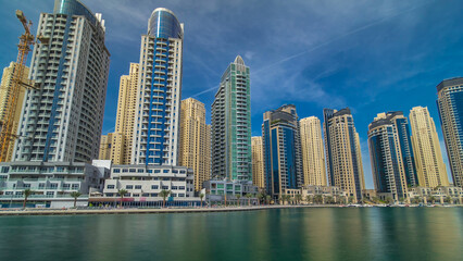 Obraz premium Dubai Marina towers in Dubai at day time timelapse hyperlapse