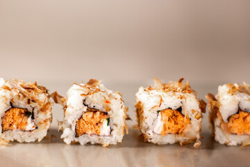 Sushi rolls. Japanese food in restaurant. Sushi roll set with salmon, vegetables and rice. Asian food concept. Japanese cuisine.