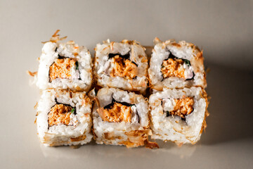 Sushi rolls. Japanese food in restaurant. Sushi roll set with salmon, vegetables and rice. Asian food concept. Japanese cuisine.