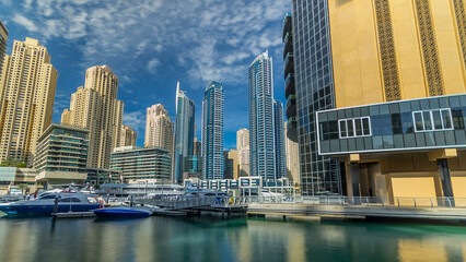 Obraz premium Dubai Marina towers in Dubai at day time timelapse hyperlapse