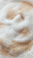 Fototapeta premium creamy coffee foam, close-up photography, soft texture