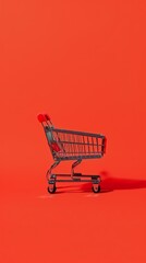 A sleek shopping cart set against a bold red backdrop, symbolizing modern retail and consumer trends.