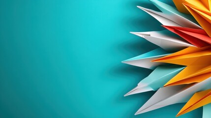 A collection of colorful paper airplanes arranged on a vibrant blue surface, capturing a sense of playfulness and creative exploration in a visually striking composition.